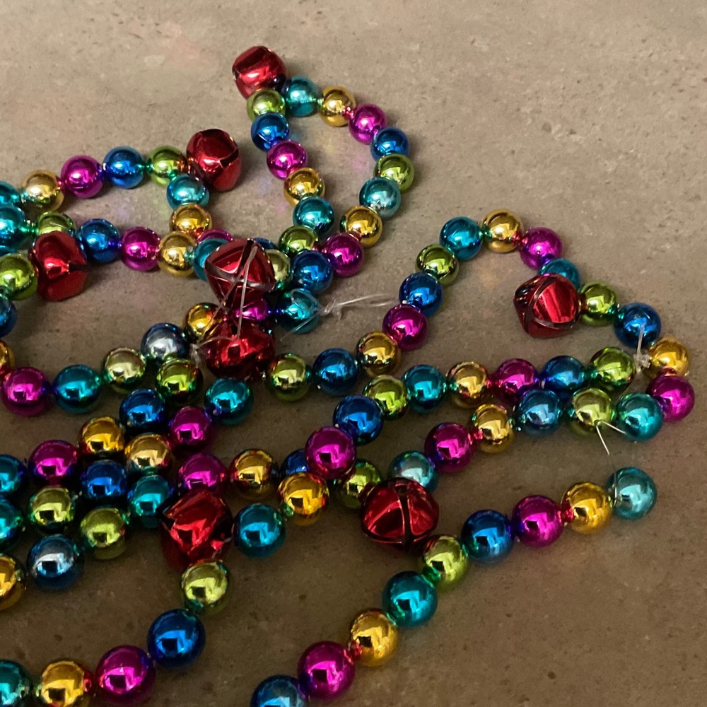 Heavy and high quality festive garland. 2 strands, 6+’each. Fun colors, like new